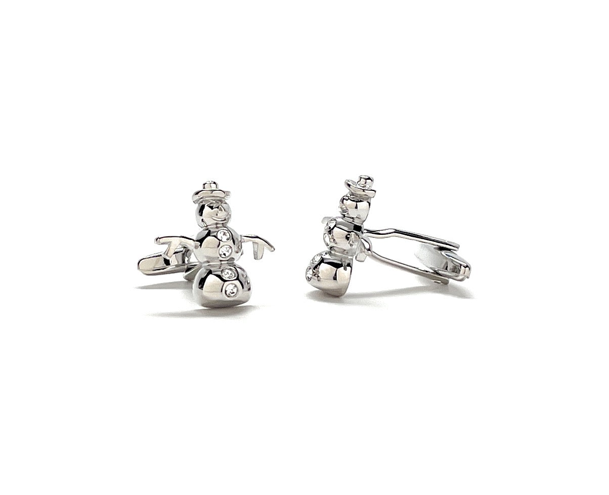 Silver snowman-shaped cufflinks on a white background