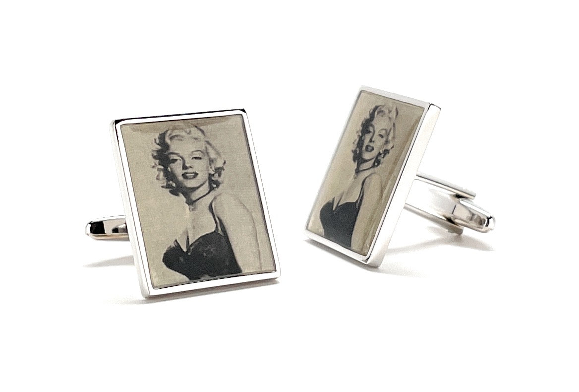 Cufflinks with a vintage-style portrait of a woman on a white background