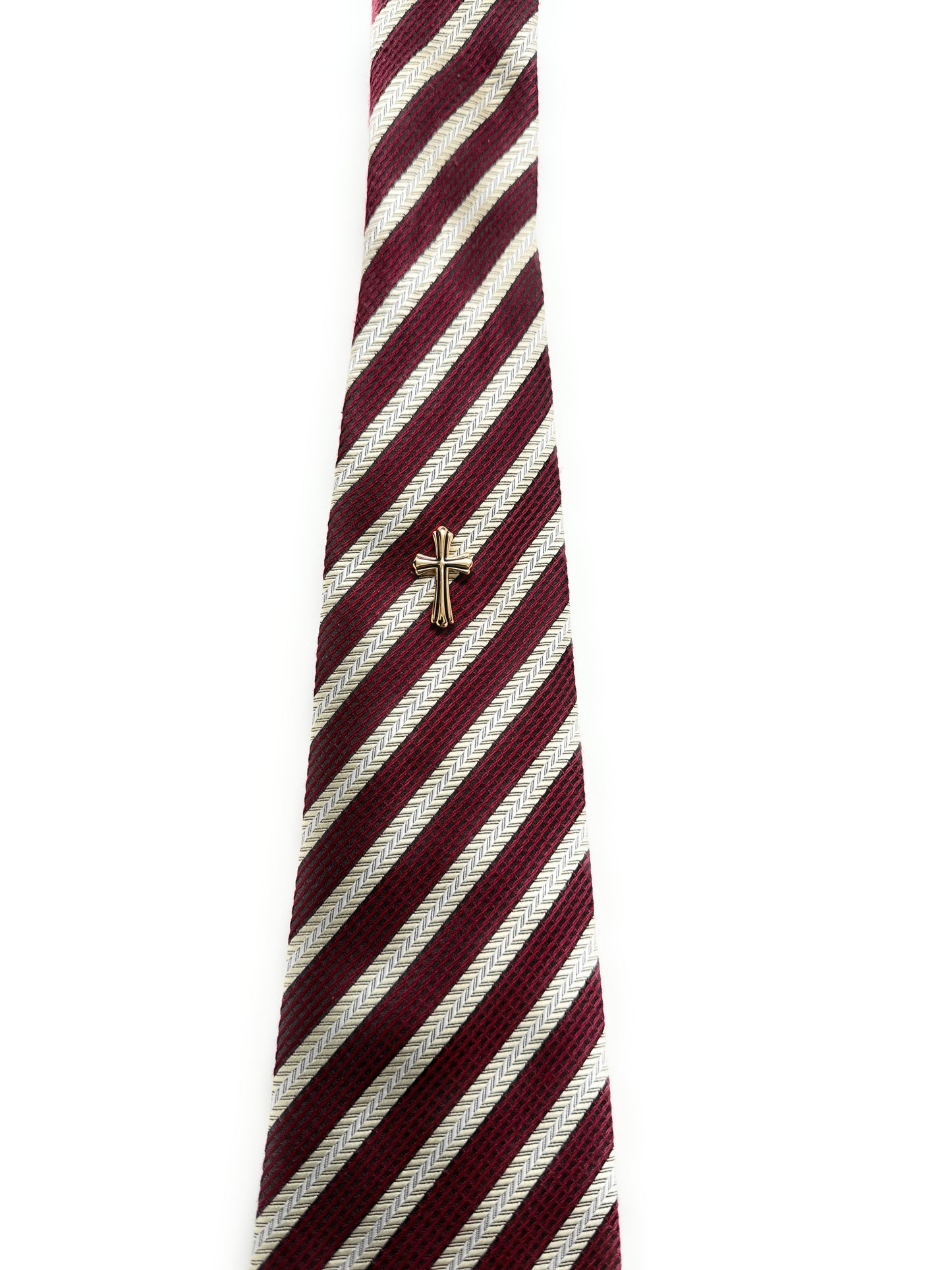Maroon and white striped tie with a gold clasp on a white background