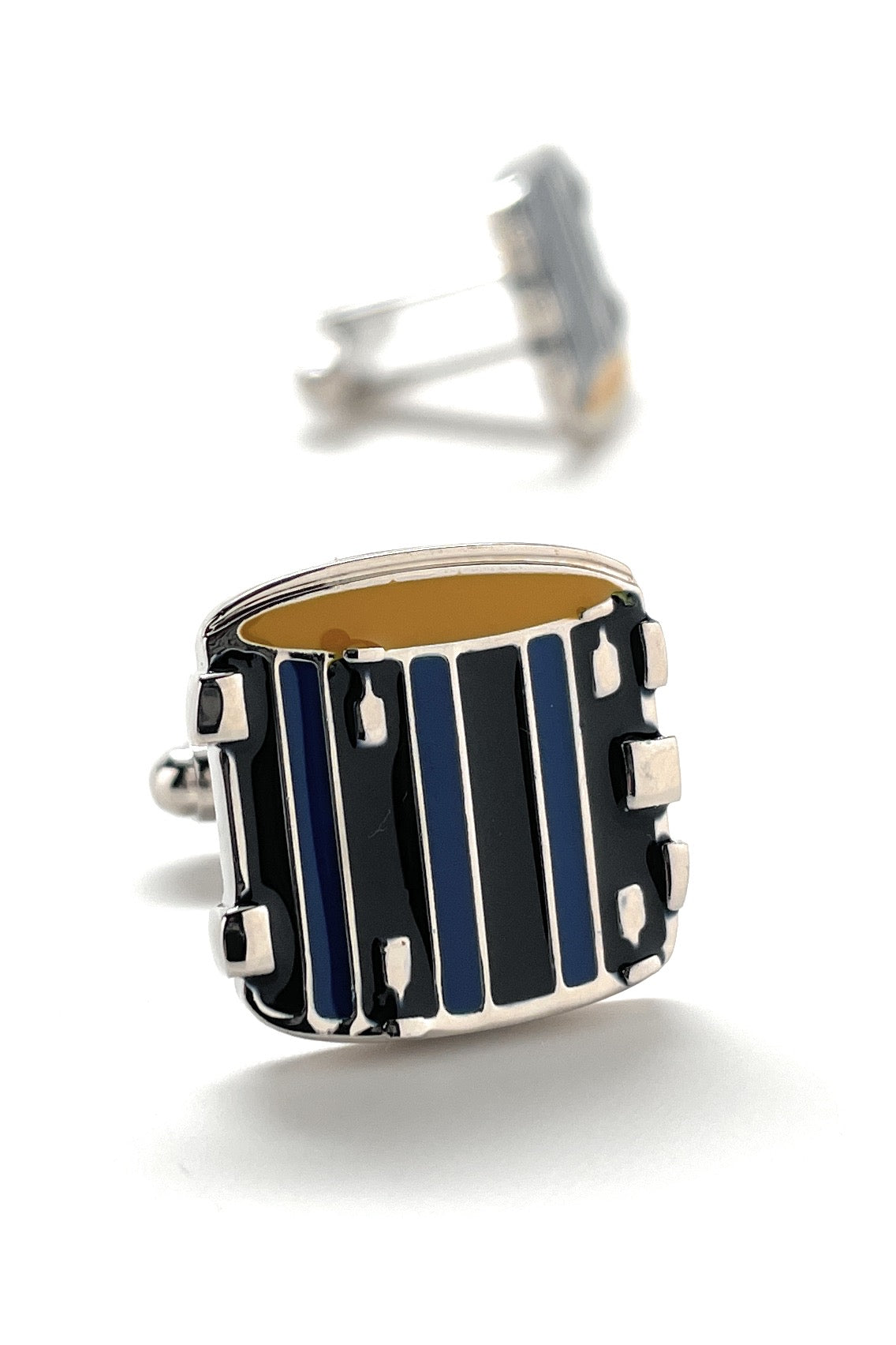 Cufflinks with a striped design on a white background