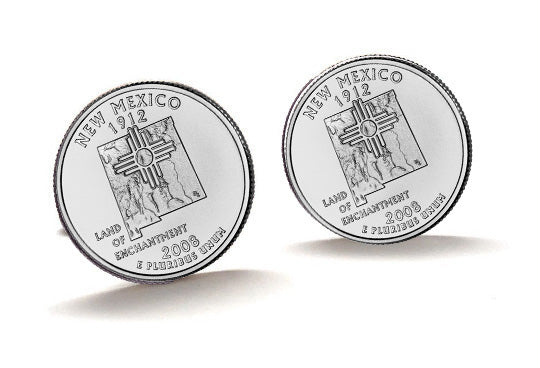 A pair of silver cufflinks featuring the design of a New Mexico state quarter coin with an inscription that reads 'NEW MEXICO 2008'.