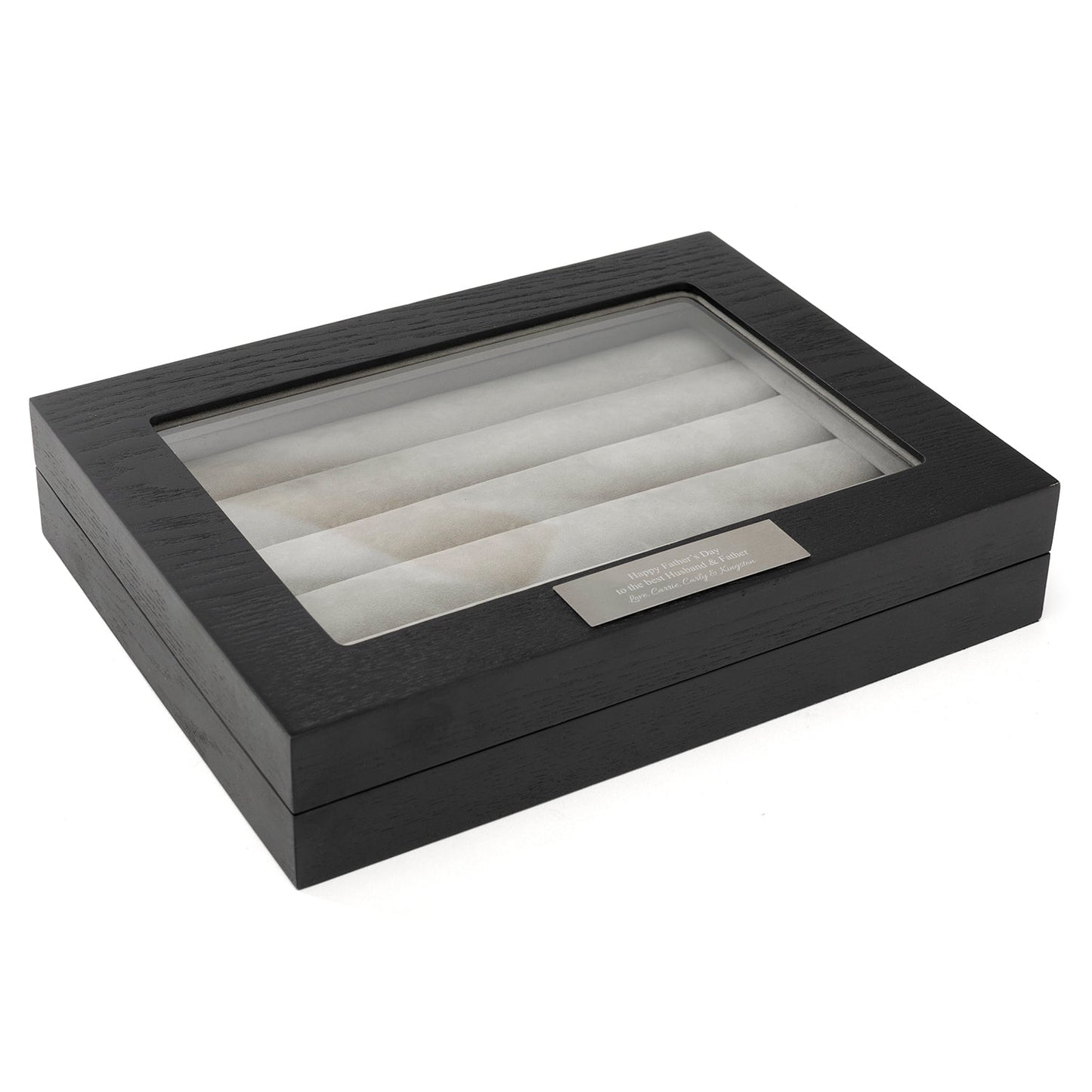 Black jewelry box with glass lid on a white background