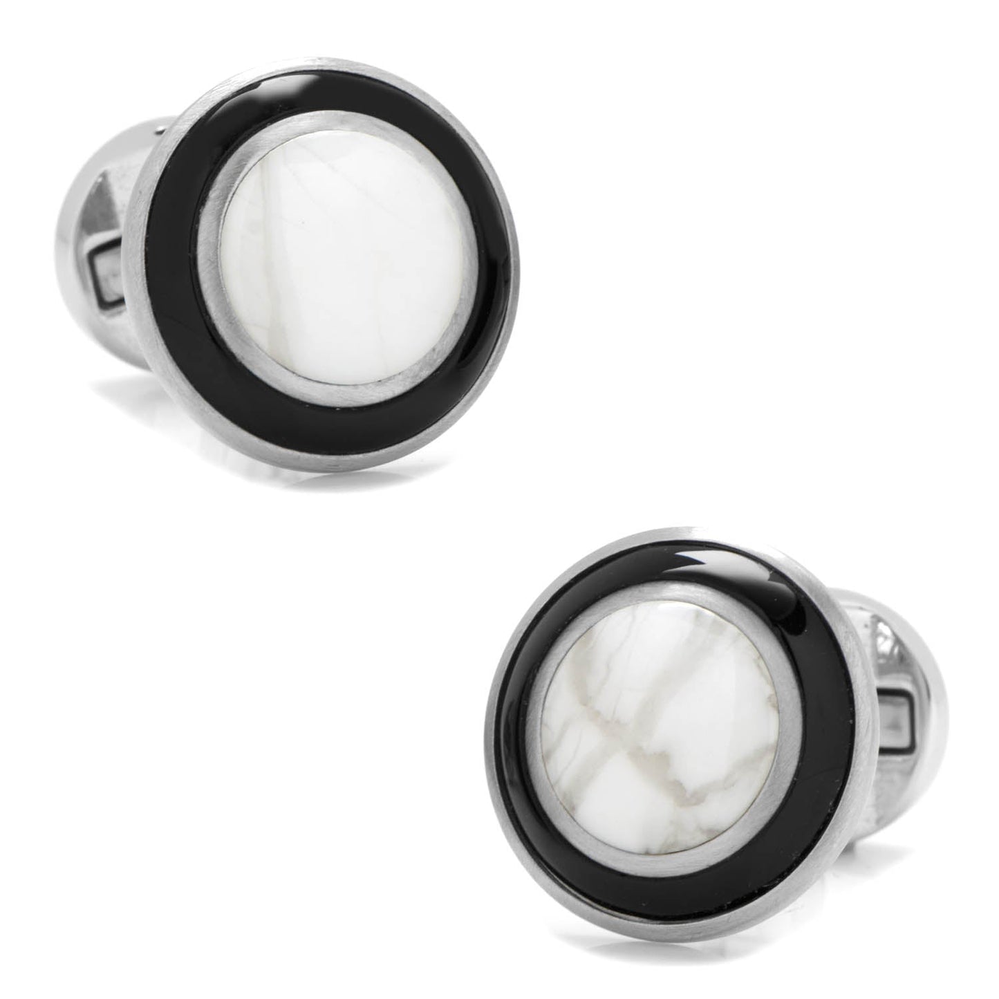 Pair of cufflinks with black and silver design on a white background