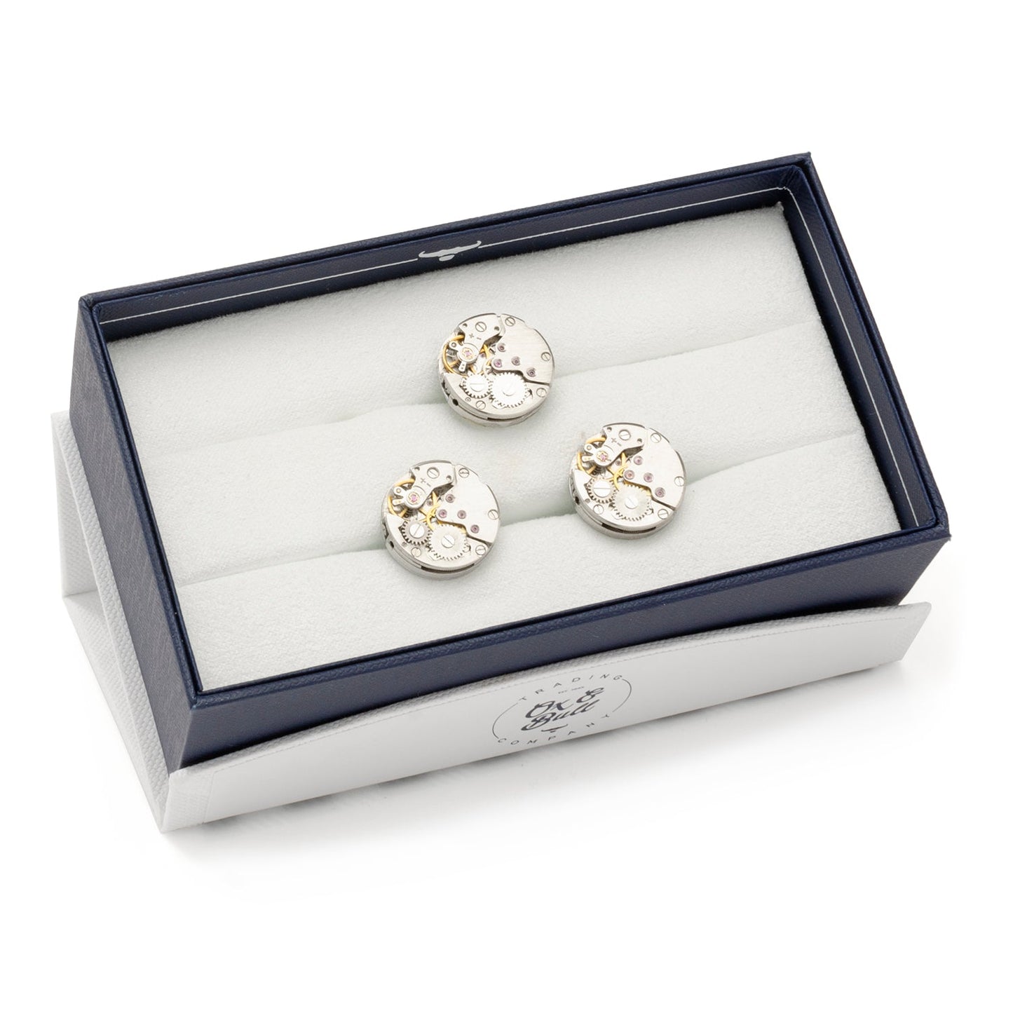 Pair of cufflinks in a jewelry box on a white background