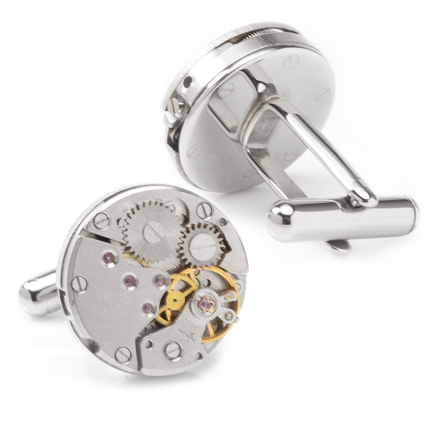 Silver cufflinks with intricate mechanical design on a white background