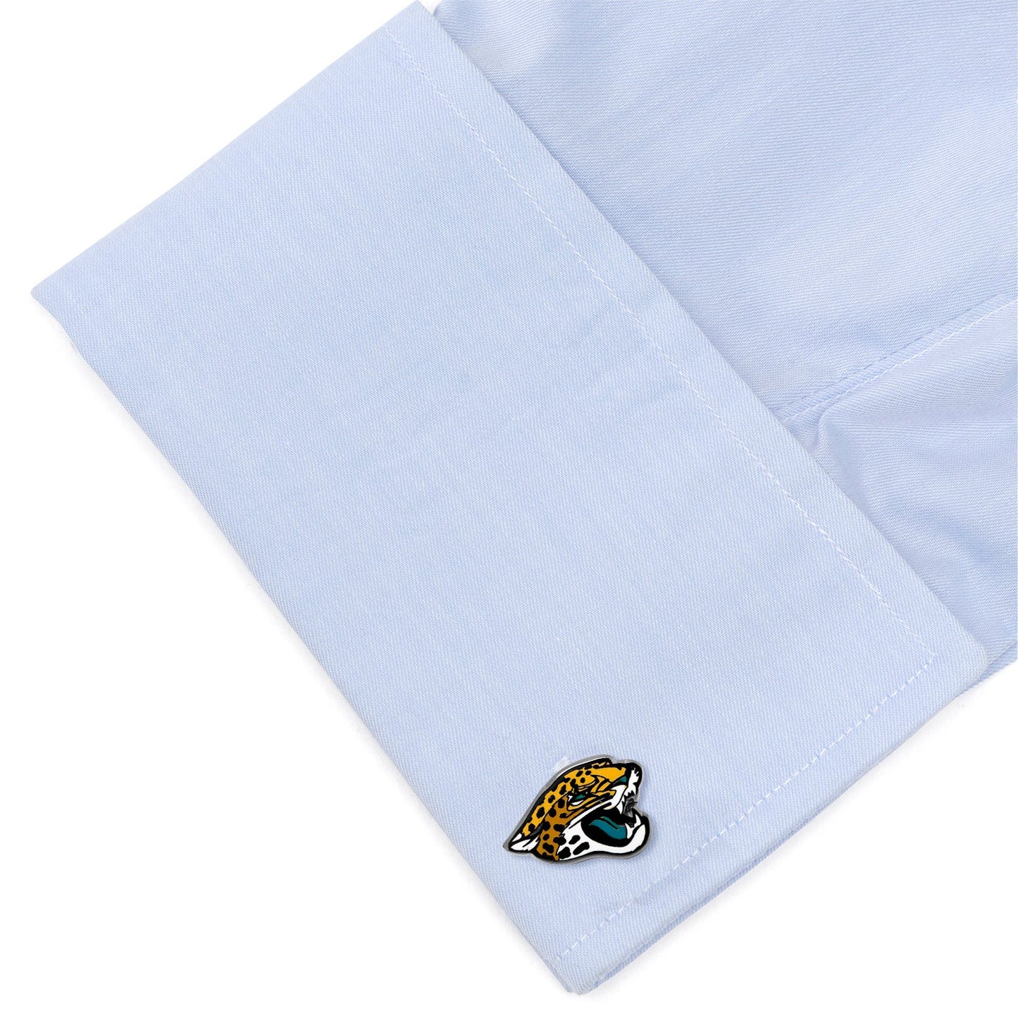 Cufflinks with a logo on light blue fabric