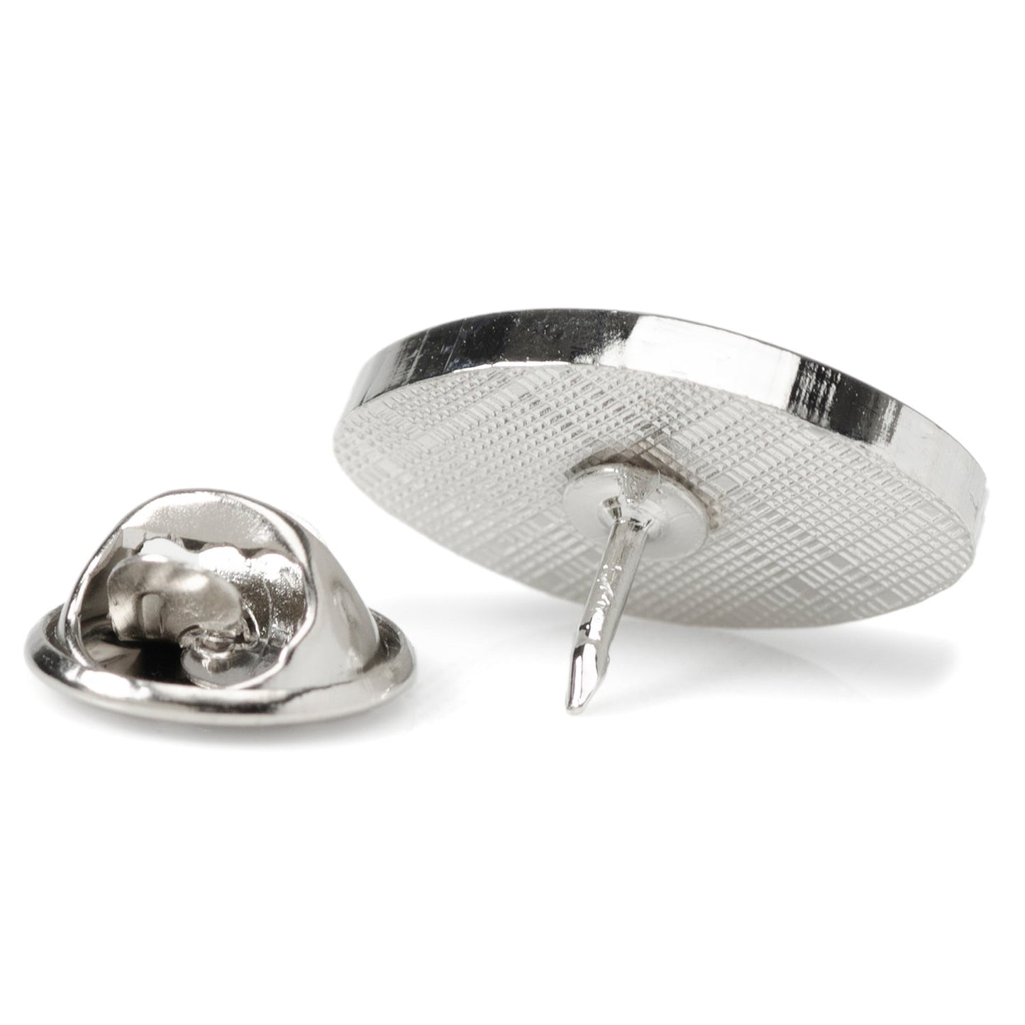 Metallic pinback button on a white background