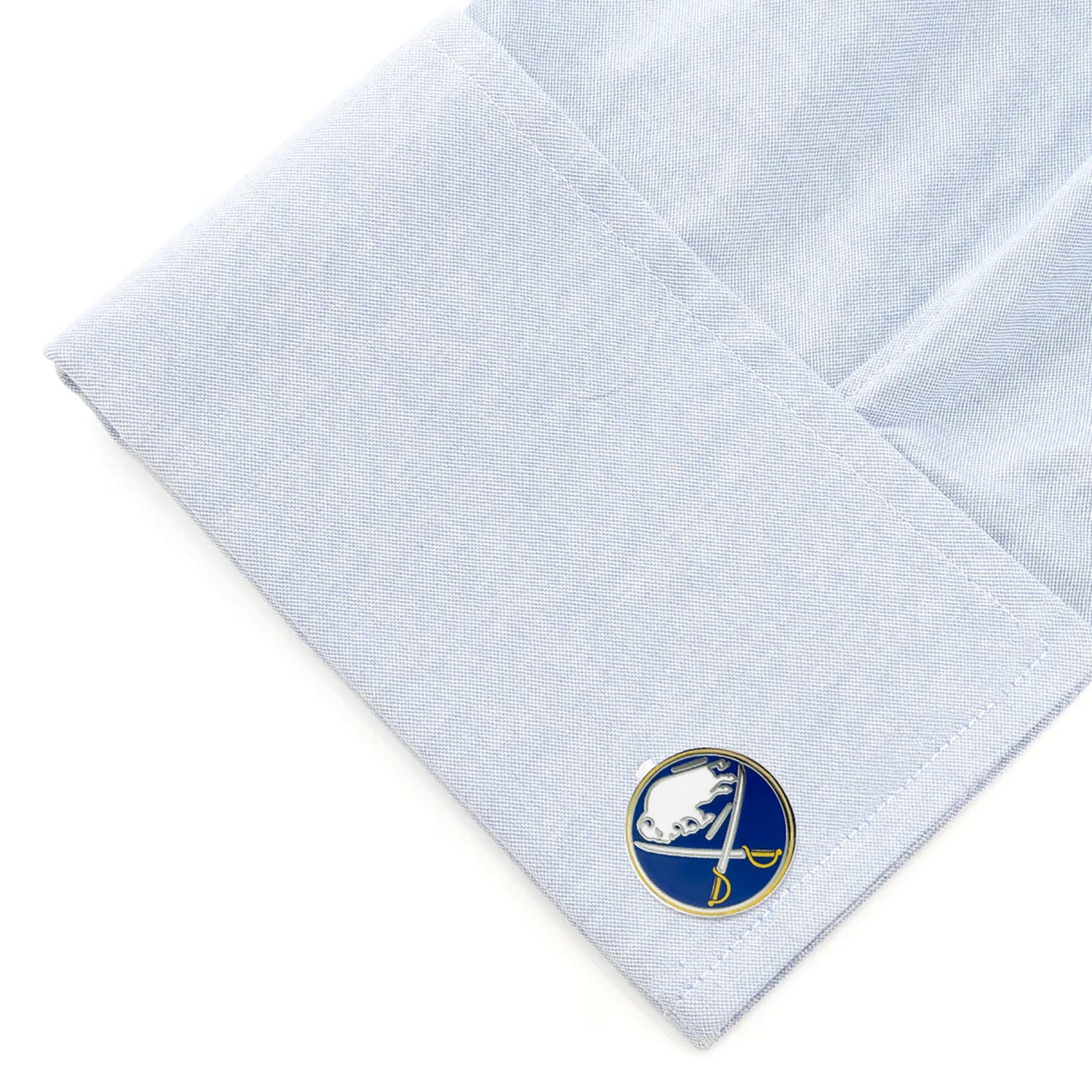 White pocket square with a blue and gold emblem on a white background