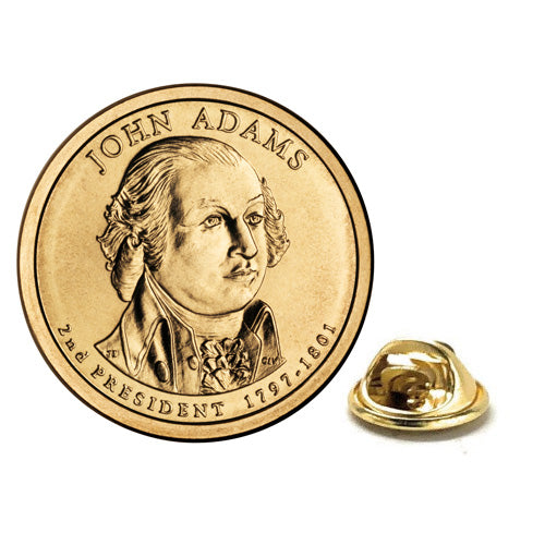 A gold-colored, enamel pin shaped like a dollar coin, featuring an engraved portrait of John Adams, with a butterfly clasp backing.