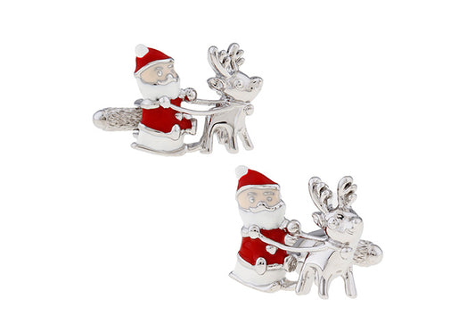 Silver cufflinks with Santa Claus and reindeer design on a white background