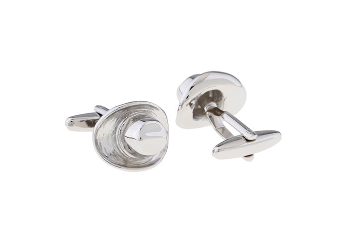Silver cufflinks on a white background