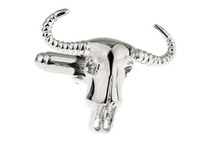 Silver bull head sculpture on a white background