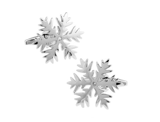 Silver snowflake earrings on a white background