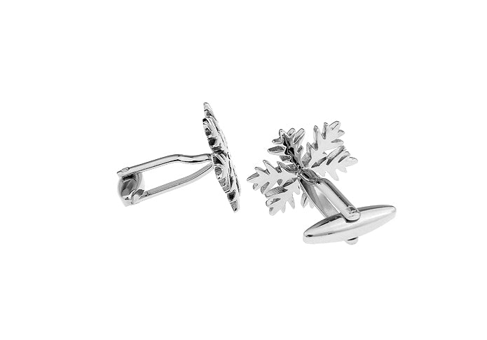 Pair of silver snowflake-shaped earrings on a white background