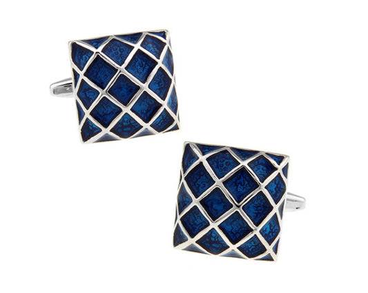 Pair of blue geometric cufflinks on a white background