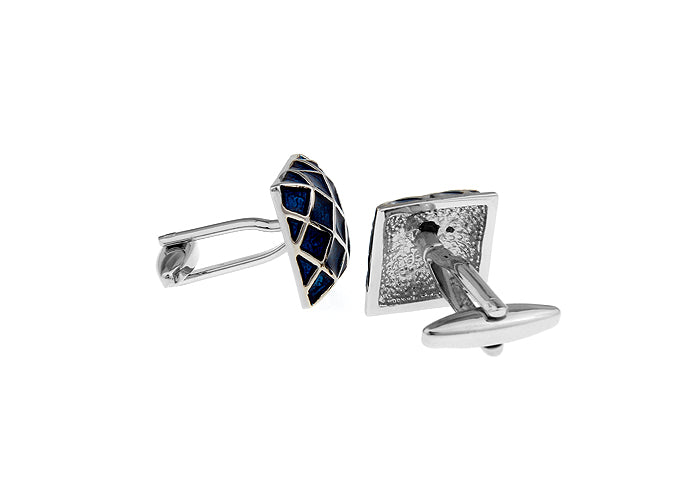 Pair of silver cufflinks with blue gemstones on a white background