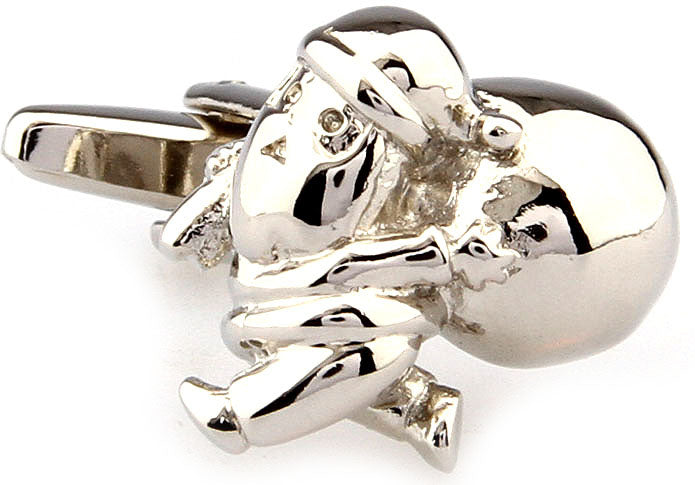 Silver baby doll-shaped cufflinks on a white background
