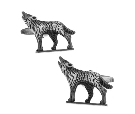 Pair of wolf-shaped cufflinks on a white background