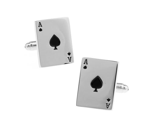Pair of silver cufflinks with black spade design on a white background