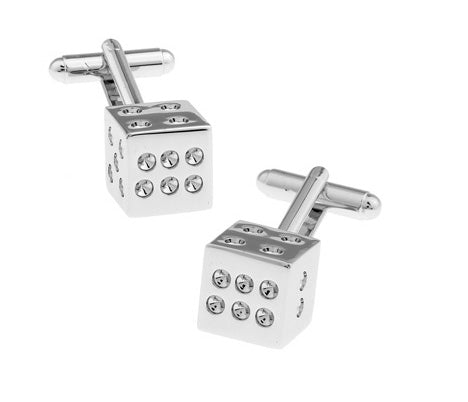 Silver dice-shaped cufflinks on a white background