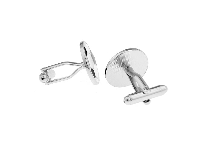 Pair of silver cufflinks on a white background