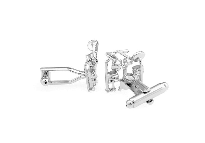 Silver cufflinks with clear gemstones on a white background