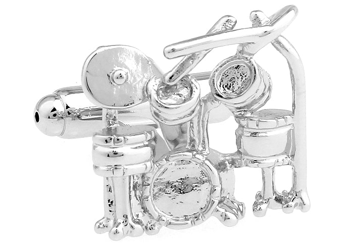 Silver drum set cufflinks on a white background