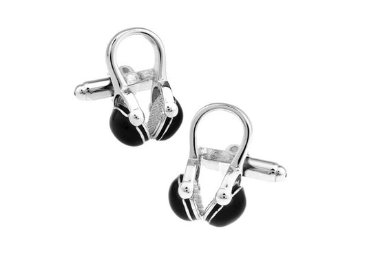 Pair of silver and black cufflinks on a white background
