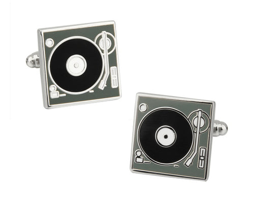 Turntable cufflinks on a white background