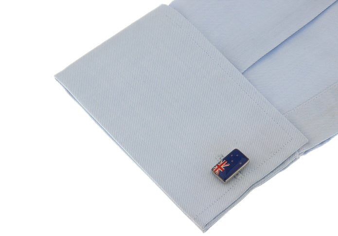Rectangular New Zealand flag cufflinks with blue enamel background and red stars, featuring the Union Jack design — perfect for formal wear or patriotic gifts.