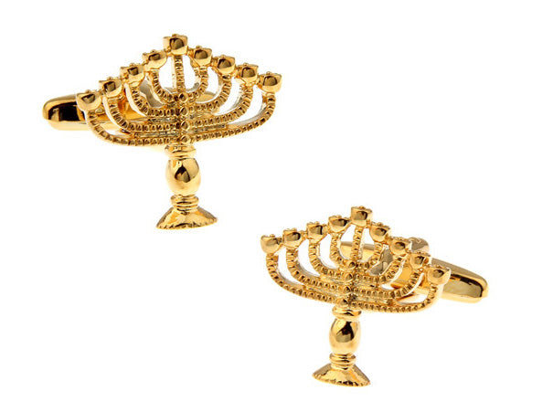 Gold Menorah cufflinks on a white background