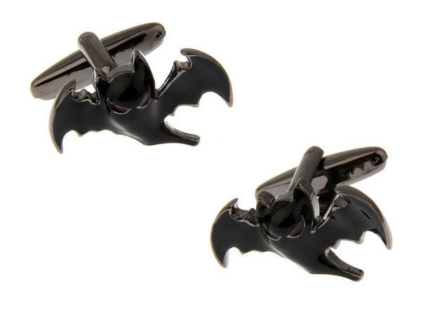 Black bat-shaped cufflinks on a white background
