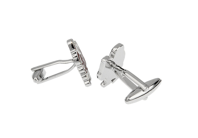 Silver cufflinks on a white background
