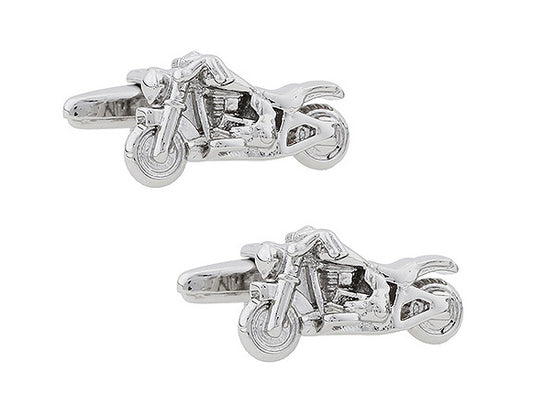 Motorcycle-shaped cufflinks on a white background