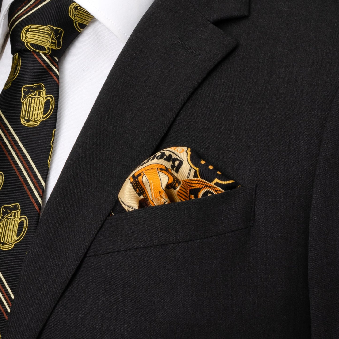 Black suit jacket with a patterned tie and pocket square.