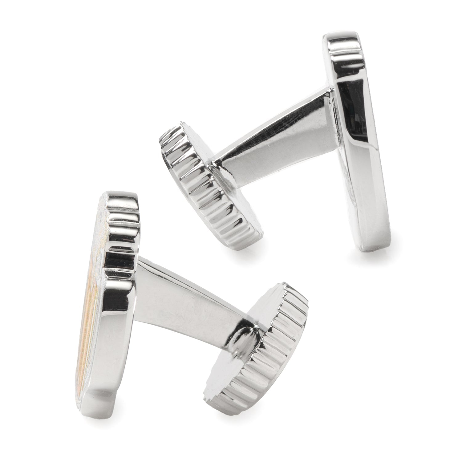 Silver cufflinks on a white background