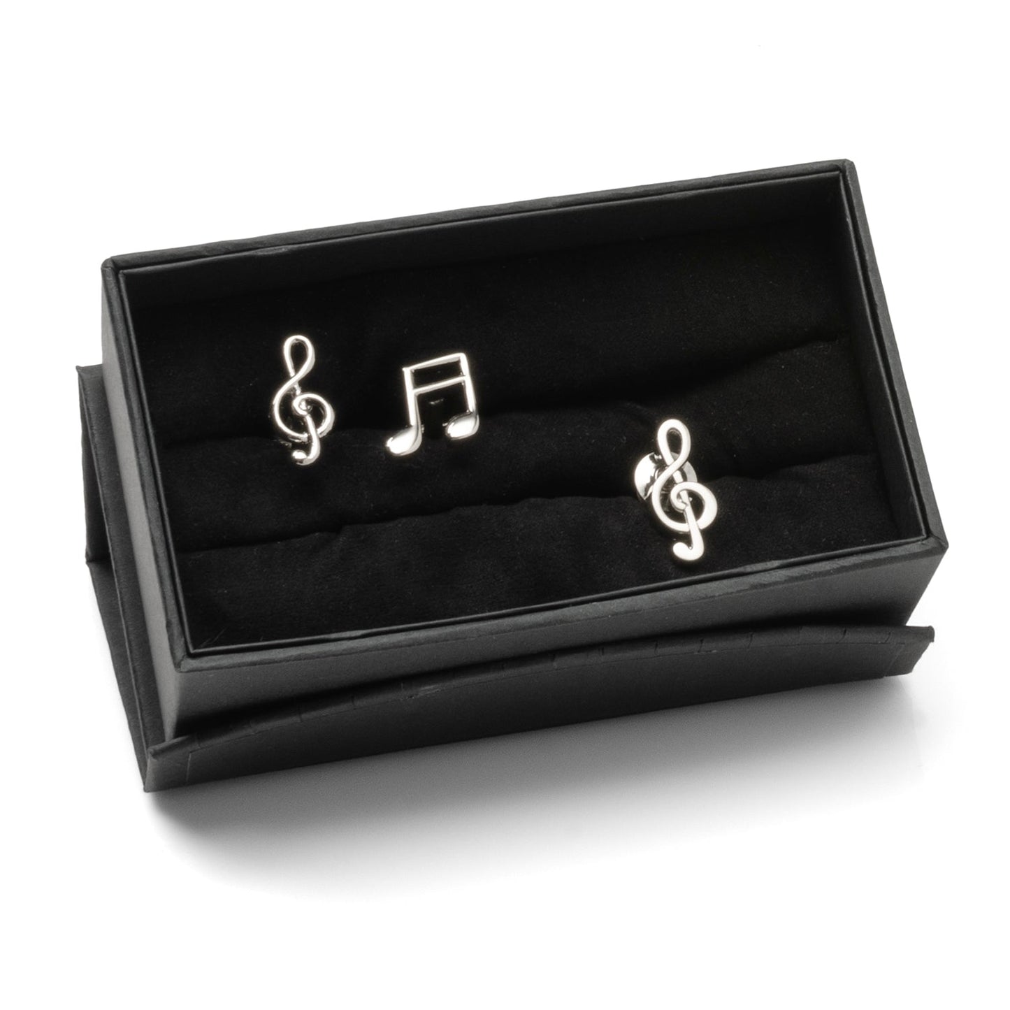 Music-themed cufflinks in a black box on a white background