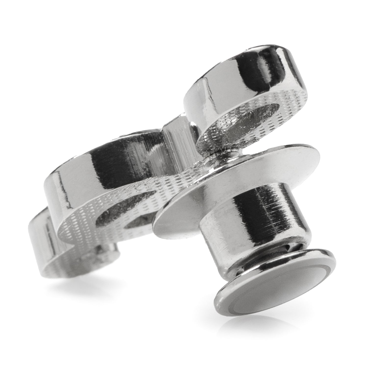 Close-up of a metallic ring with interlocking components on a white background