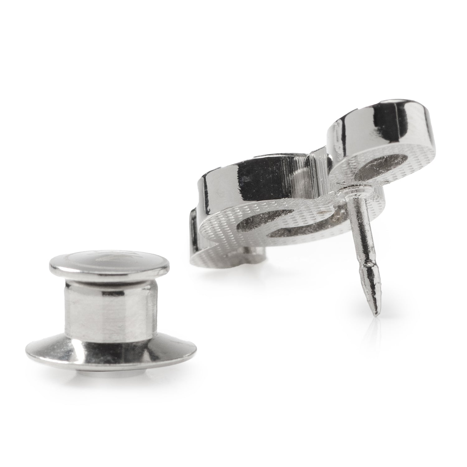 Silver spool and thread clamp on a white background