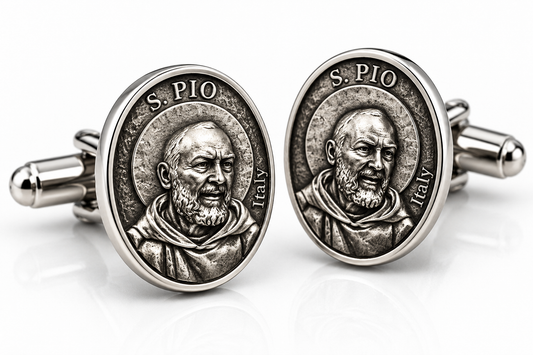 A pair of silver-toned oval cufflinks featuring an embossed portrait of Saint Pio of Pietrelcina with 'S. PIO' and 'Italy' inscribed on the face, shown on a clean white background.