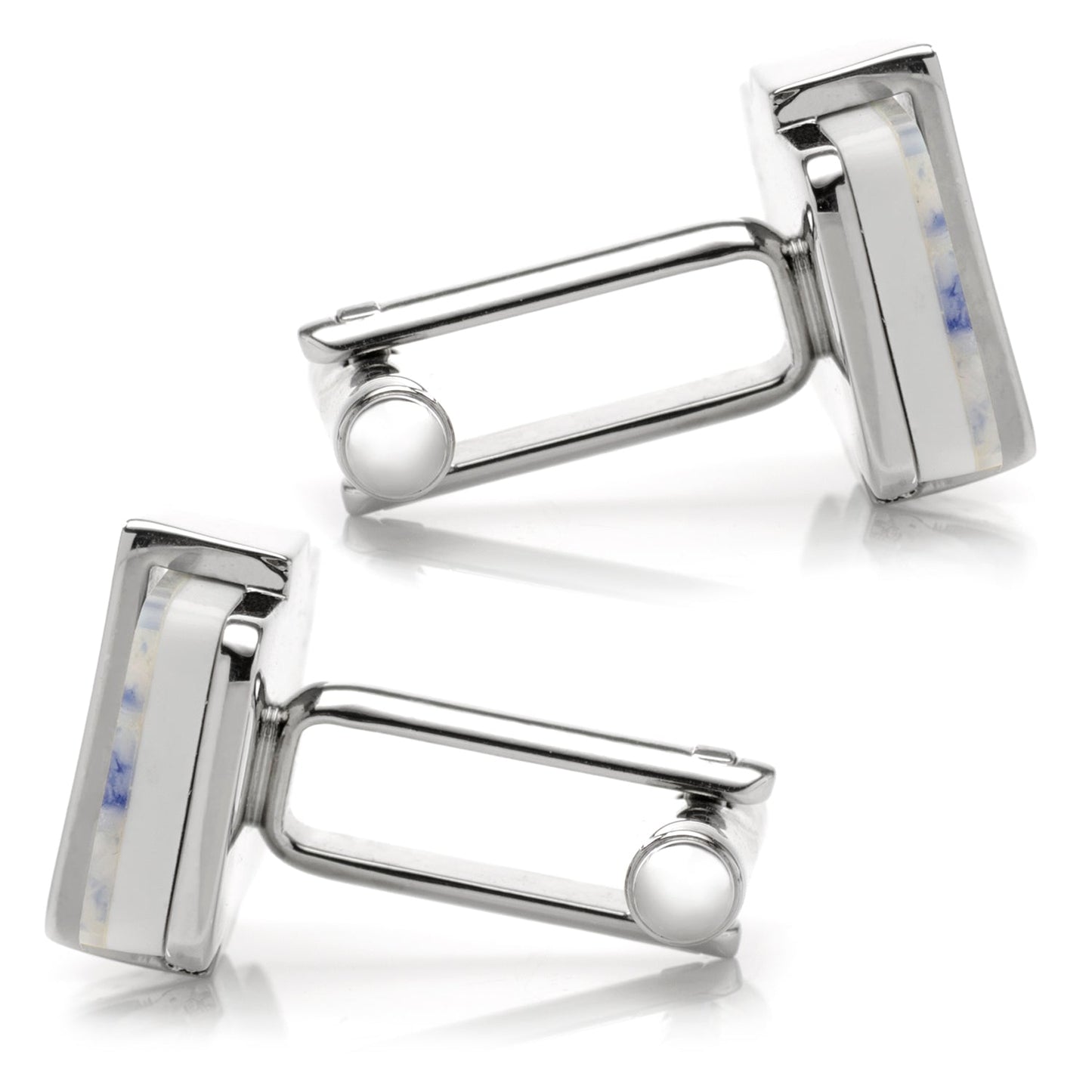 Pair of silver cufflinks on a white background