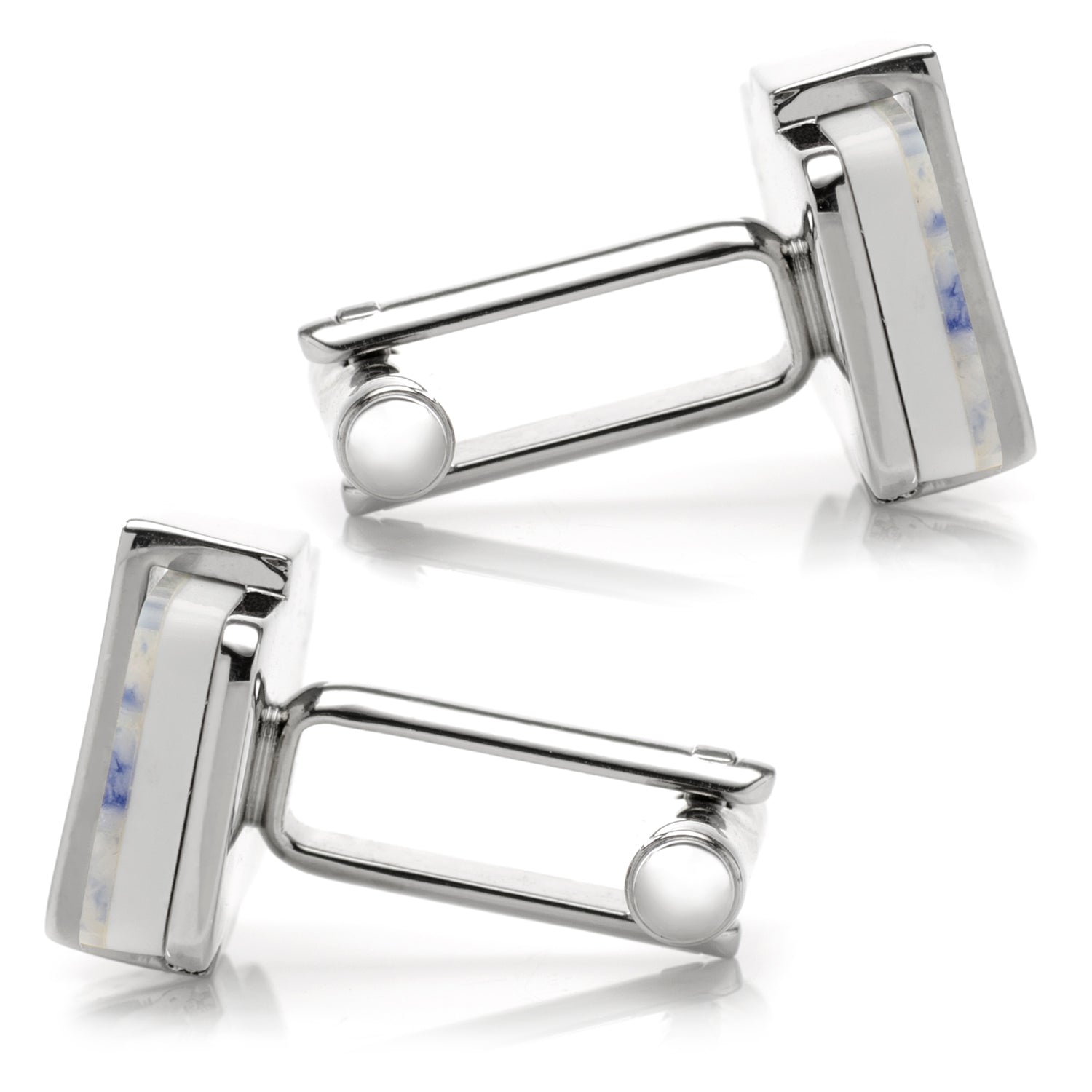 Pair of silver cufflinks on a white background