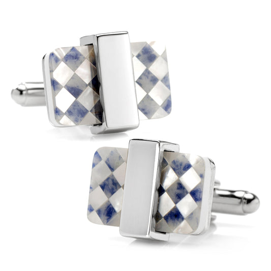 Pair of cufflinks with checkered pattern and silver accents on a white background
