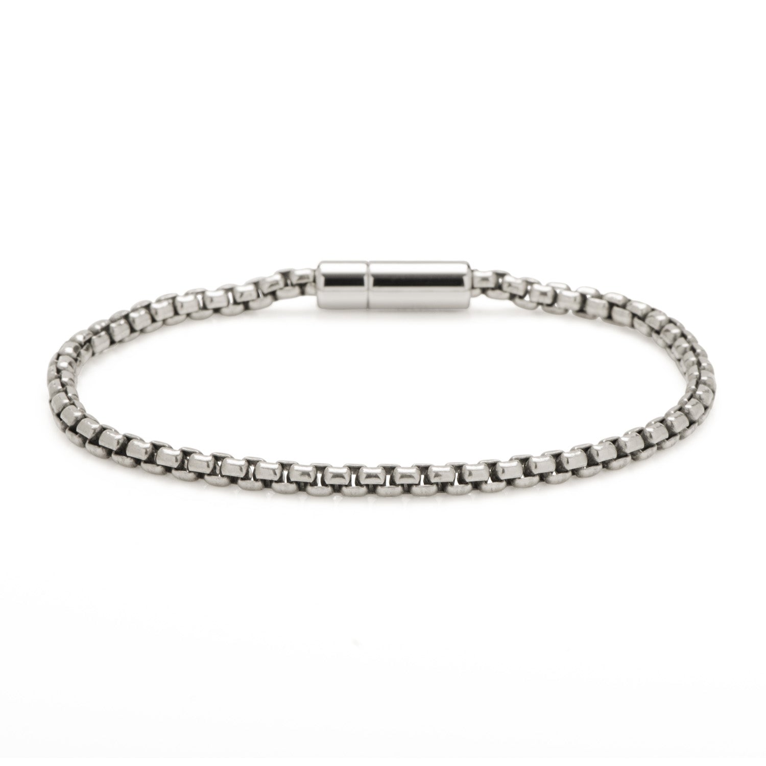 Silver bracelet with a magnetic clasp on a white background