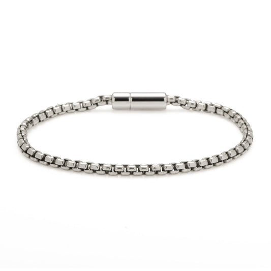 Silver bracelet with a magnetic clasp on a white background