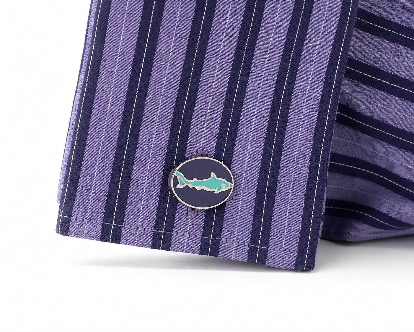 Close-up of a purple and navy striped fabric with a logo on a white background