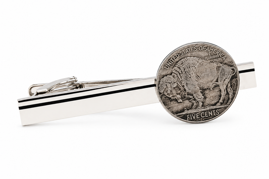 A silver-toned tie bar featuring a circular Buffalo nickel coin design on one end, shown on a clean white background.