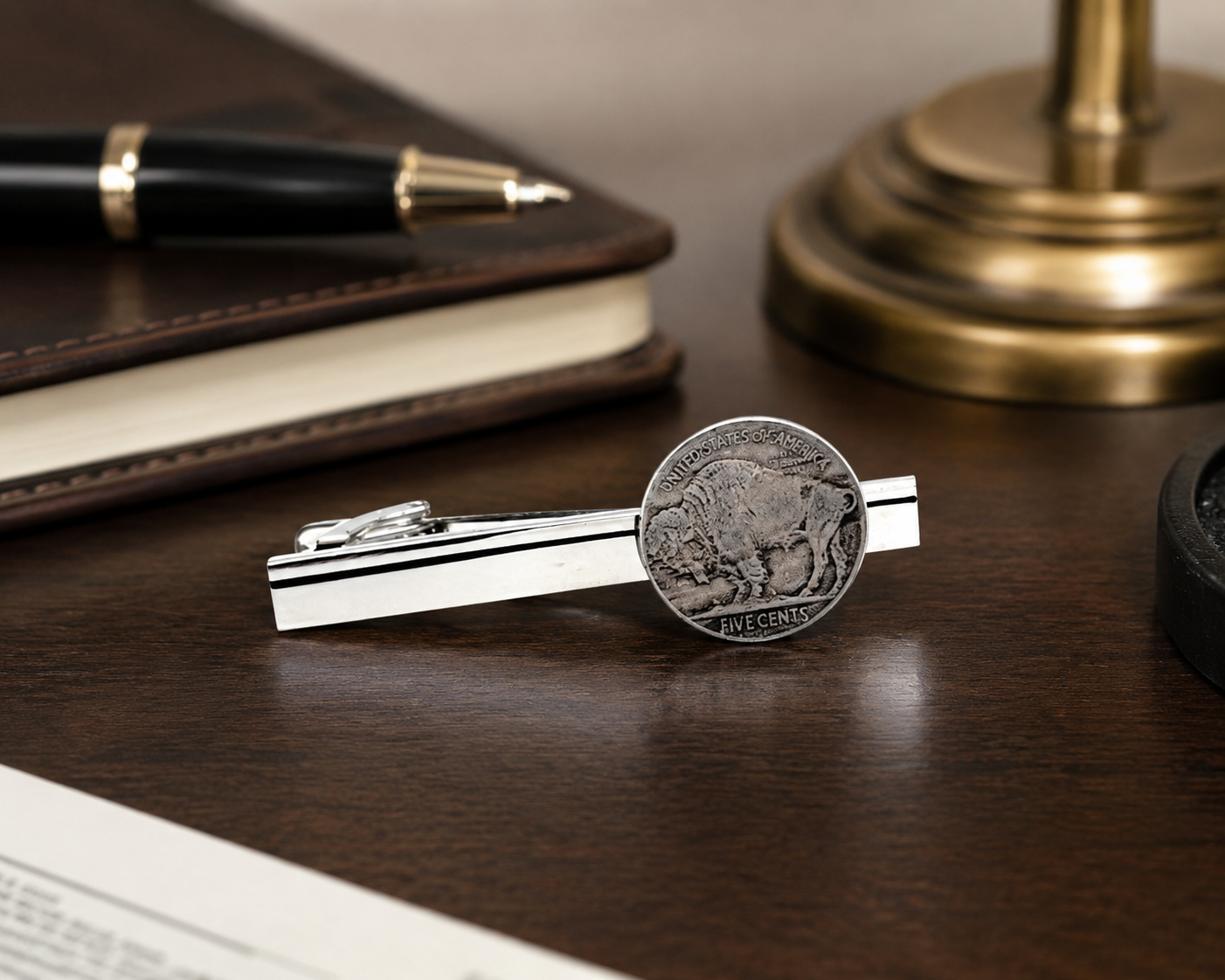 Buffalo Nickel tie clip handcrafted from a genuine U.S. Buffalo Nickel featuring the iconic American buffalo mounted on a polished silver tie clip.