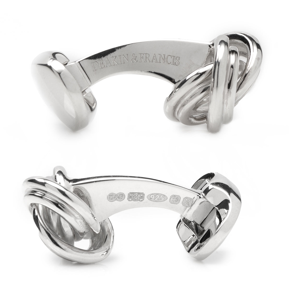 Pair of silver horse bit rings with 'Tinkers & Francis' branding on a white background