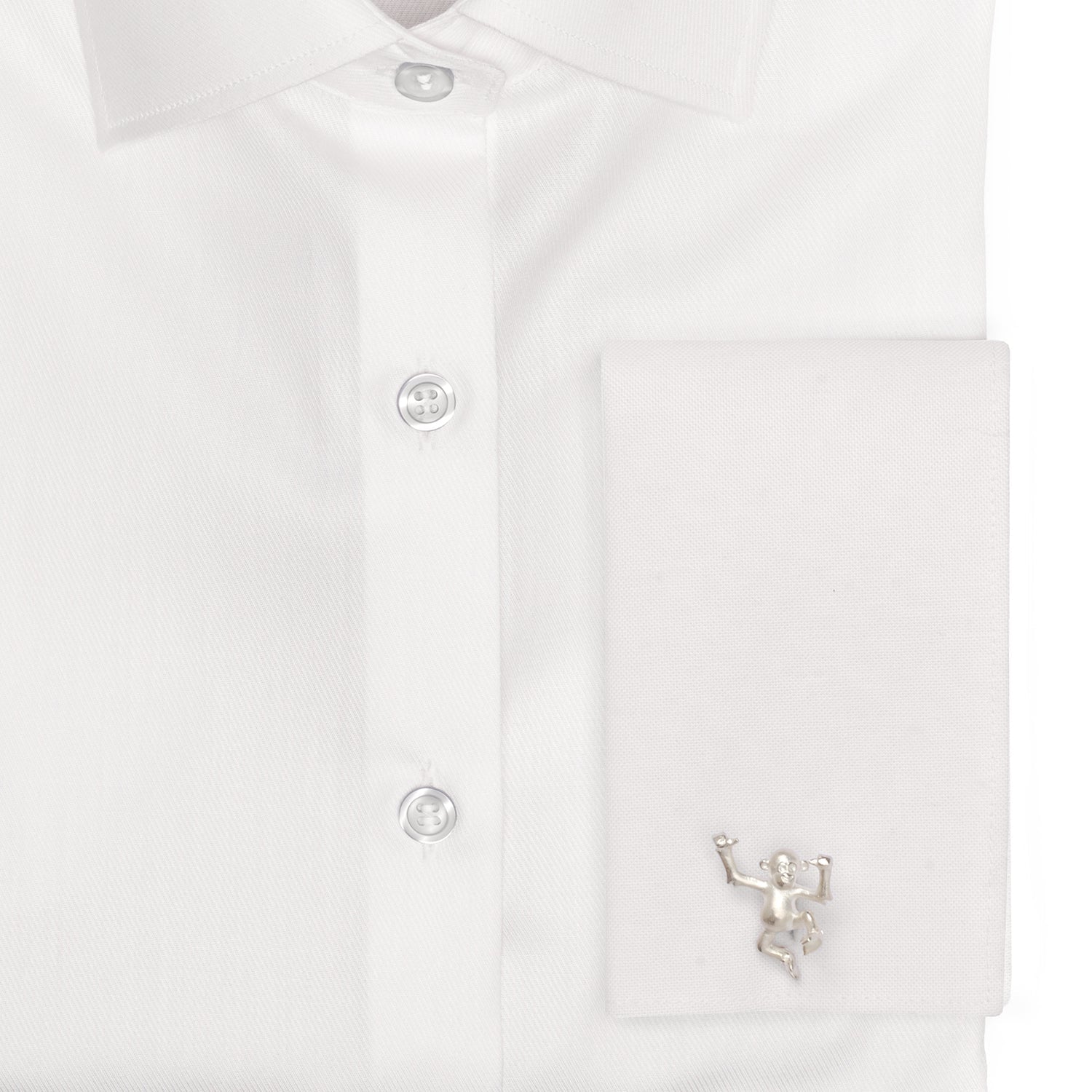 White shirt with a small decorative figure on a white background